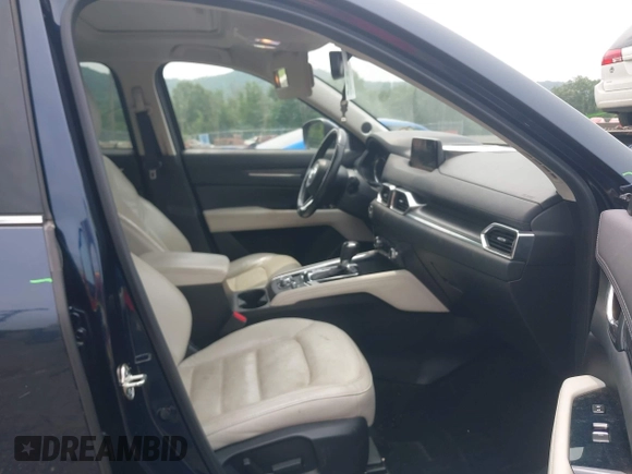 2018 Mazda CX-5 Grand Touring with VIN JM3KFBDMXJ0361812, listed as a IAAI auction lot 42509752 with 131,386 mi miles and . Bid and sale history available at DreamBid. Image 5.