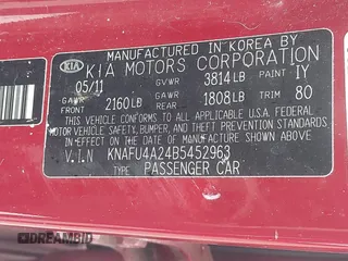 2011 Kia Forte EX with VIN KNAFU4A24B5452963, listed as a IAAI auction lot 41925159 with 90,963 mi miles. Bid and sale history available at carsss.com. Image 9.