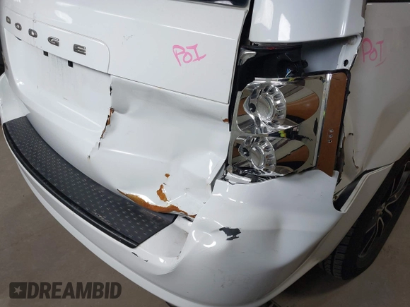 2019 Dodge Grand Caravan SE with VIN 2C4RDGBG8KR503122, listed as a IAAI auction lot 41983380 with 128,692 mi miles and . Bid and sale history available at DreamBid. Image 18.