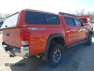 2016 Toyota Tacoma SR with VIN 3TMCZ5AN0GM001120, listed as a IAAI auction lot 41769108 with 190,635 mi miles and . Bid and sale history available at DreamBid. Image 4.