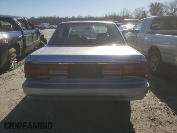 1991 Toyota Camry DLX z VIN 4T1SV21E2MU451022, wystawiony jako Copart lot #45333385 z przebiegiem 229 058 mil mil oraz Szkoda całkowita • Salvage title. Historia ofert i sprzedaży dostępna na DreamBid. Obrazek 6.