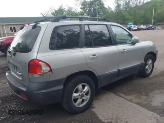 2006 Hyundai Santa Fe GLS with VIN KM8SC13D56U071213, listed as a IAAI auction lot 42239720 with 155,106 mi miles and . Bid and sale history available at DreamBid. Image 4.