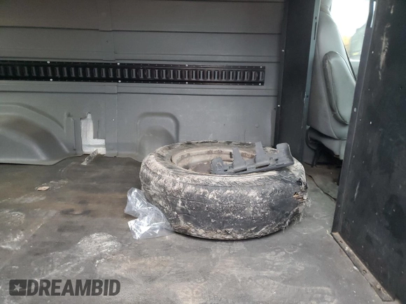 2010 Ford Econoline Cargo Commercial with VIN 1FTNE1EW2ADA56736, listed as a Copart auction lot 82539414 with 116,603 mi miles and Non Repairable. Bid and sale history available at DreamBid. Image 12.