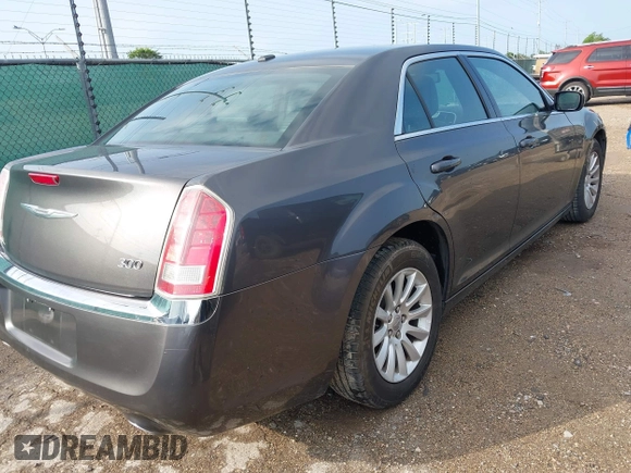 2013 Chrysler 300 with VIN 2C3CCAAG0DH556501, listed as a IAAI auction lot 42104305 with 91,914 mi miles. Bid and sale history available at carsss.com. Image 4.