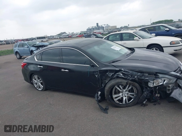 2016 Nissan Altima SL z VIN 1N4BL3AP7GC157407, wystawiony jako IAAI lot #42276362 z przebiegiem 133 343 mil mil oraz . Historia ofert i sprzedaży dostępna na DreamBid. Obrazek 13.