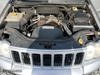 2009 Jeep Grand Cherokee Laredo with VIN 1J8GR48K09C551423, listed as a Copart auction lot 54094465 with 163,263 mi miles and Clean Title. Bid and sale history available at carsss.com. Image 12.