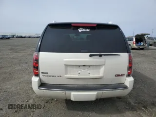 2010 GMC Yukon XL Denali with VIN 1GKUKMEF9AR153123, listed as a Copart auction lot 48748525 with 171,519 mi miles and Salvage Title. Bid and sale history available at carsss.com. Image 6.