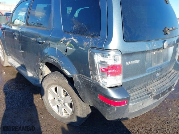 2010 Mercury Mariner with VIN 4M2CN9BG0AKJ02637, listed as a IAAI auction lot 41579241 with 128,095 mi miles. Bid and sale history available at carsss.com. Image 6.
