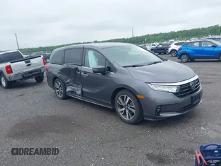 2023 Honda Odyssey Touring z VIN 5FNRL6H87PB019264, wystawiony jako IAAI lot #42198877 z przebiegiem 39 948 mil mil oraz . Historia ofert i sprzedaży dostępna na DreamBid. Obrazek 1.