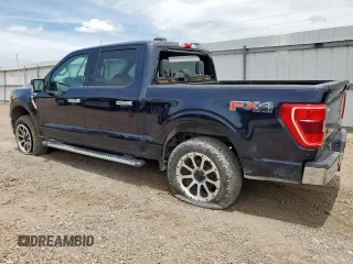 2021 Ford F-150 XL with VIN 1FTFW1E80MFA32611, listed as a Copart auction lot 61899255 with 98,278 mi miles and Salvage title. Bid and sale history available at DreamBid. Image 2.