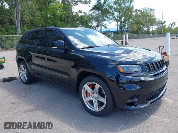 2017 Jeep Grand Cherokee SRT z VIN 1C4RJFDJ8HC653924, wystawiony jako IAAI lot #42108099 z przebiegiem 61 560 mil mil oraz . Historia ofert i sprzedaży dostępna na DreamBid. Obrazek 1.