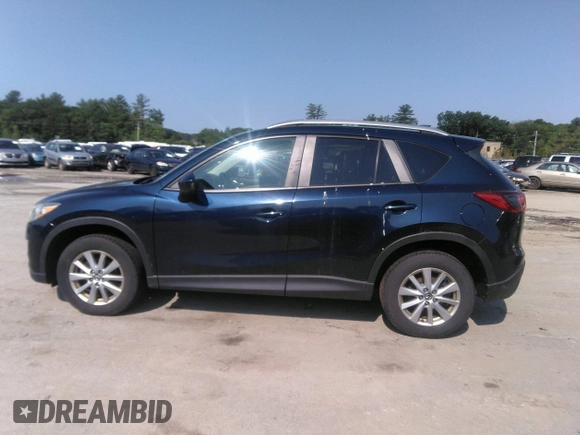 2014 Mazda CX-5 Touring z VIN JM3KE2CYXE0429149, wystawiony jako IAAI lot #42471772 z przebiegiem 222 440 mil mil oraz . Historia ofert i sprzedaży dostępna na DreamBid. Obrazek 14.