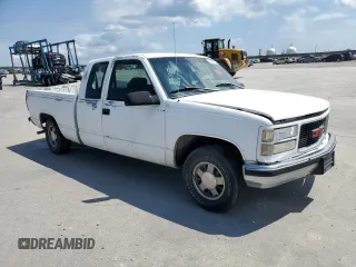 1996 GMC Sierra 1500 with VIN 2GTEC19W8T1520613, listed as a Copart auction lot 70603714 with 356,192 mi miles and Salvage Title. Bid and sale history available at DreamBid. Image 4.