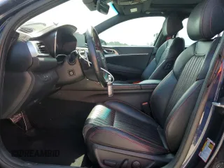 2023 Genesis G70 2.0T with VIN KMTG34TA5PU110175, listed as a Copart auction lot 58297715 with 43,716 mi miles and Salvage title. Bid and sale history available at DreamBid. Image 7.