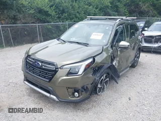 2023 Subaru Forester Touring with VIN JF2SKARC6PH400678, listed as a IAAI auction lot 42694547 with 14,484 mi miles and . Bid and sale history available at DreamBid. Image 22.