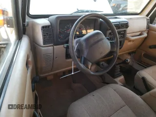2002 Jeep Wrangler SE with VIN 1J4FA29P82P756330, listed as a Copart auction lot 83659574 with 156,901 mi miles and Salvage Title. Bid and sale history available at DreamBid. Image 8.