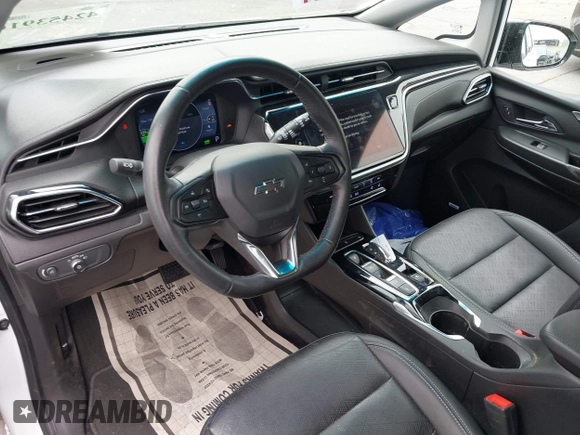 2023 Chevrolet Bolt EV 2LT z VIN 1G1FX6S07P4198027, wystawiony jako IAAI lot #42453916 z przebiegiem 5 133 mil mil oraz . Historia ofert i sprzedaży dostępna na DreamBid. Obrazek 22.