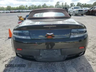 2013 Aston Martin Vantage z VIN SCFEKBBK1DGD17118, wystawiony jako Copart lot #60636224 z przebiegiem 50 591 mil mil oraz Szkody całkowita. Historia ofert i sprzedaży dostępna na DreamBid. Obrazek 6.