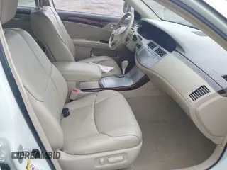 2010 Toyota Avalon XL with VIN 4T1BK3DB8AU354533, listed as a IAAI auction lot 41802797 with 117,956 mi miles and . Bid and sale history available at carsss.com. Image 5.