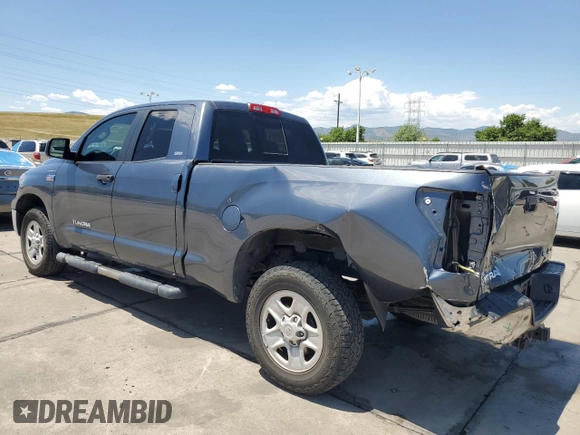 2010 Toyota Tundra with VIN 5TFUW5F14AX148898, listed as a Copart auction lot 63316765 with 79,983 mi miles and Salvage title. Bid and sale history available at DreamBid. Image 2.