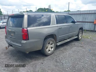 2017 Chevrolet Suburban LT with VIN 1GNSKHKC7HR356677, listed as a IAAI auction lot 42491581 with 129,496 mi miles and . Bid and sale history available at DreamBid. Image 4.