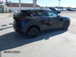 2022 Mazda CX-30 2.5 Turbo with VIN 3MVDMBAY3NM440688, listed as a IAAI auction lot 40860258 with 27,445 mi miles and . Bid and sale history available at DreamBid. Image 4.