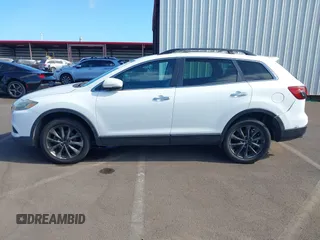 2015 Mazda CX-9 Grand Touring с VIN JM3TB2DA7F0456065, выставлен на аукционе IAAI как лот 42328501 с пробегом 116 951 миль миль и . История ставок и продаж доступна на DreamBid. Изображение 14.
