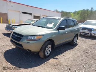 2009 Hyundai Santa Fe GLS with VIN 5NMSG13D19H331269, listed as a IAAI auction lot 42005021 with 120,215 mi miles. Bid and sale history available at carsss.com. Image 2.