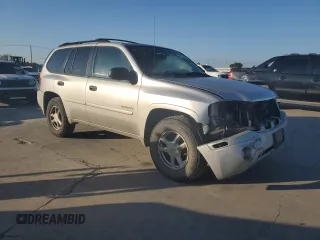 2006 GMC Envoy SLE with VIN 1GKDS13S962219216, listed as a Copart auction lot 71656164 with 328,966 mi miles and Salvage Title. Bid and sale history available at carsss.com. Image 4.