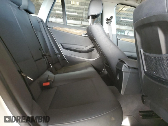 2015 BMW X1 sDrive28i with VIN WBAVM1C50FVW58031, listed as a Copart auction lot 48552735 with 205,392 mi miles and Salvage Title. Bid and sale history available at carsss.com. Image 11.