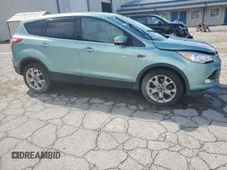 2013 Ford Escape SEL z VIN 1FMCU9H98DUC56048, wystawiony jako Copart lot #61613085 z przebiegiem 198 102 mil mil oraz Szkoda całkowita • Salvage title. Historia ofert i sprzedaży dostępna na DreamBid. Obrazek 4.