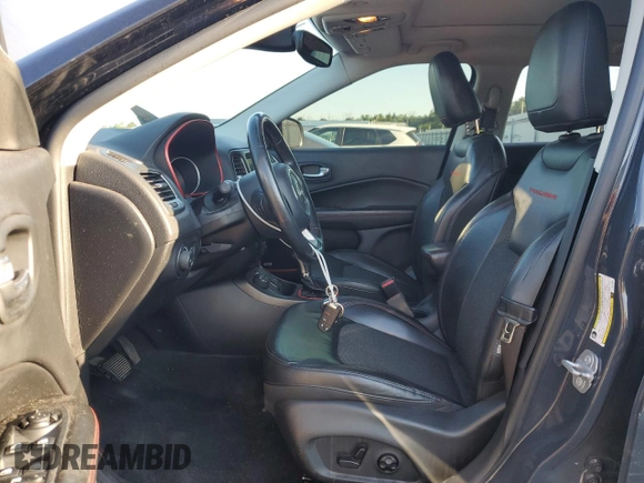 2018 Jeep Compass Trailhawk с VIN 3C4NJDDB5JT412005, выставлен на аукционе Copart как лот 65649535 с пробегом 105 912 миль миль и Списание • Salvage title. История ставок и продаж доступна на DreamBid. Изображение 7.