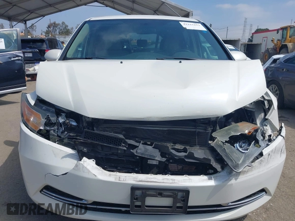 2016 Honda Odyssey SE with VIN 5FNRL5H33GB043303, listed as a IAAI auction lot 42215233 with 67,097 mi miles and . Bid and sale history available at DreamBid. Image 12.