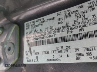 2014 Ford Escape SE with VIN 1FMCU9G98EUD26411, listed as a IAAI auction lot 41686493 with 132,644 mi miles. Bid and sale history available at carsss.com. Image 9.