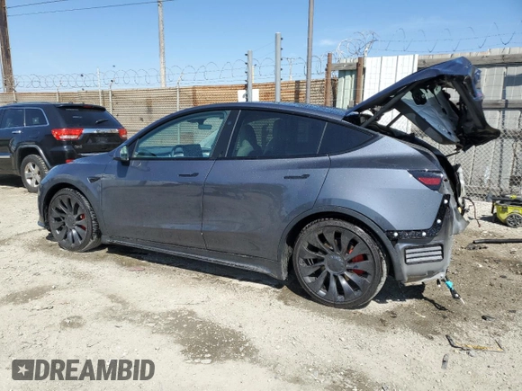 2023 Tesla Model Y Performance with VIN 7SAYGDEF0PF915030, listed as a Copart auction lot 50159375 with 19,772 mi miles and Salvage Title. Bid and sale history available at DreamBid. Image 2.