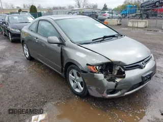 2006 Honda Civic Cpe EX with VIN 2HGFG12866H520496, listed as a IAAI auction lot 41990642 with 140,459 mi miles. Bid and sale history available at carsss.com. Image 1.