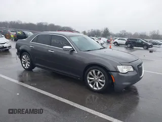 2016 Chrysler 300 with VIN 2C3CCAKG5GH334703, listed as a IAAI auction lot 40877306 with 141,799 mi miles. Bid and sale history available at carsss.com. Image 1.