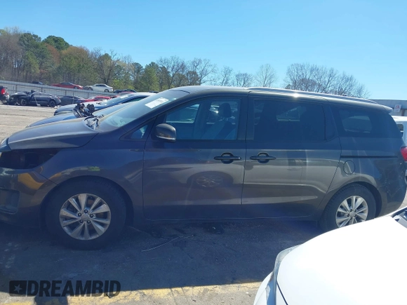 2017 Kia Sedona LX with VIN KNDMB5C14H6329340, listed as a IAAI auction lot 41803814 with 106,672 mi miles. Bid and sale history available at carsss.com. Image 14.