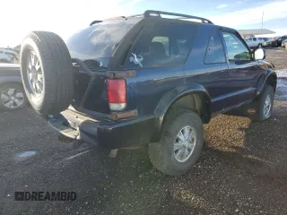 2003 GMC Jimmy z VIN 1GKCT18X13K112296, wystawiony jako Copart lot #46479275 z przebiegiem Nie podano mil oraz Czysty tytuł • Clean title. Historia ofert i sprzedaży dostępna na DreamBid. Obrazek 4.