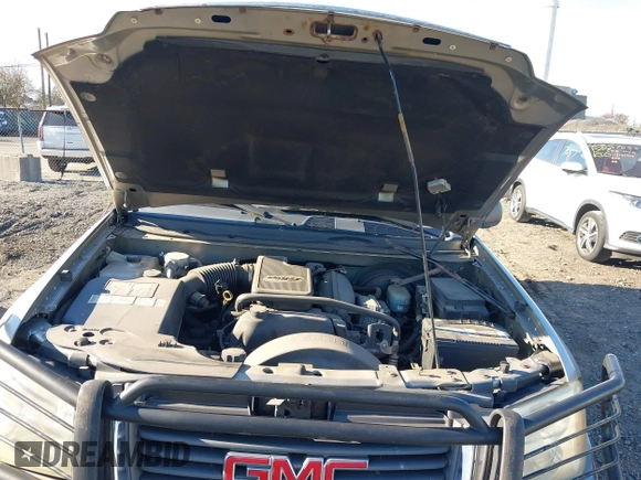2002 GMC Envoy SLT with VIN 1GKDT13S822304832, listed as a IAAI auction lot 40874054 with 132,883 mi miles. Bid and sale history available at carsss.com. Image 10.