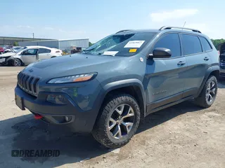 2014 Jeep Cherokee Trailhawk z VIN 1C4PJMBSXEW273520, wystawiony jako IAAI lot #42569063 z przebiegiem 137 585 mil mil oraz . Historia ofert i sprzedaży dostępna na DreamBid. Obrazek 17.