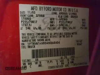 2004 Ford F-150 XLT with VIN 1FTRW14W04KB68404, listed as a Copart auction lot 56980045 with 171,584 mi miles and Salvage title. Bid and sale history available at DreamBid. Image 12.