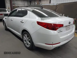 2013 Kia Optima EX with VIN 5XXGN4A79DG120709, listed as a IAAI auction lot 42004745 with 171,409 mi miles. Bid and sale history available at carsss.com. Image 3.