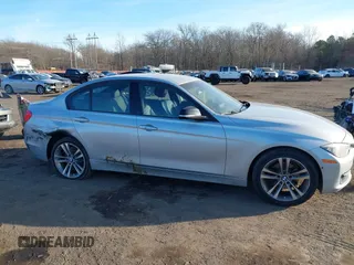 2013 BMW 3 Series 328i xDrive with VIN WBA3B3C56DF540744, listed as a IAAI auction lot 41433347 with 162,328 mi miles and . Bid and sale history available at DreamBid. Image 13.