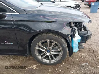 2019 Ford Fusion Hybrid Titanium with VIN 3FA6P0RU4KR144445, listed as a IAAI auction lot 42059840 with 90,617 mi miles. Bid and sale history available at carsss.com. Image 21.