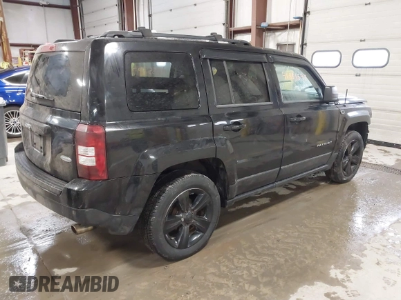 2014 Jeep Patriot Latitude with VIN 1C4NJPFB4ED645447, listed as a IAAI auction lot 41851597 with 128,319 mi miles and . Bid and sale history available at carsss.com. Image 4.