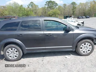 2017 Dodge Journey SE with VIN 3C4PDCABXHT538885, listed as a IAAI auction lot 41919599 with 170,311 mi miles and . Bid and sale history available at DreamBid. Image 13.