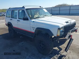 1995 Jeep Cherokee Sport with VIN 1J4FJ68S1SL576255, listed as a IAAI auction lot 42178902 with 214,041 mi miles and . Bid and sale history available at DreamBid. Image 1.