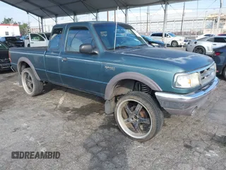 1997 Ford Ranger XLT with VIN 1FTDR15X5VPA65640, listed as a IAAI auction lot 41436818 with 212,661 mi miles. Bid and sale history available at carsss.com. Image 1.