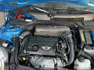 2012 MINI Hardtop S with VIN WMWSV3C57CTY27965, listed as a Copart auction lot 58686275 with 227,175 mi miles and Clean title. Bid and sale history available at DreamBid. Image 7.